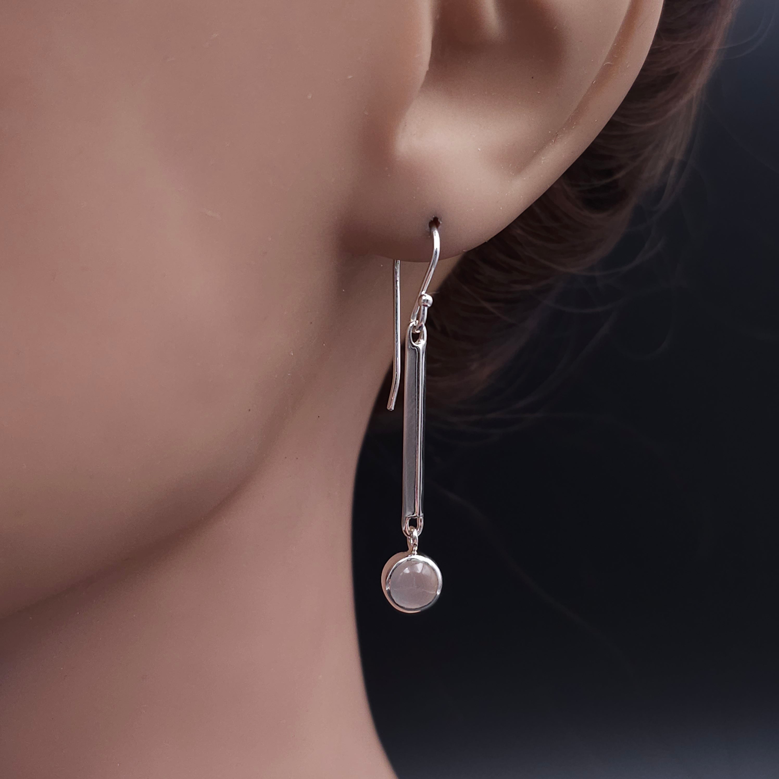 Sterling silver bar dangle earrings with bezel set Moonstones