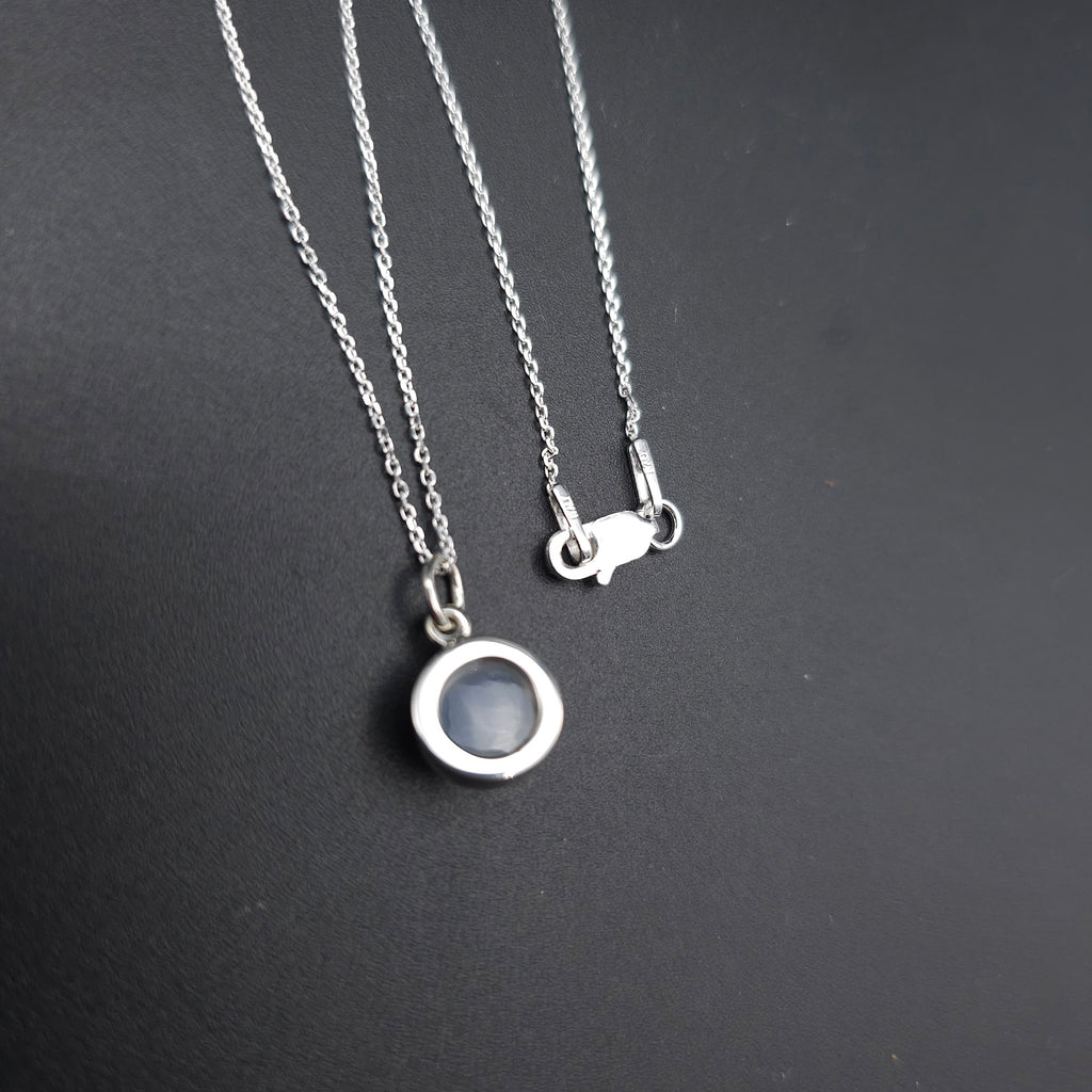 Round moonstone bezel set sterling silver necklace