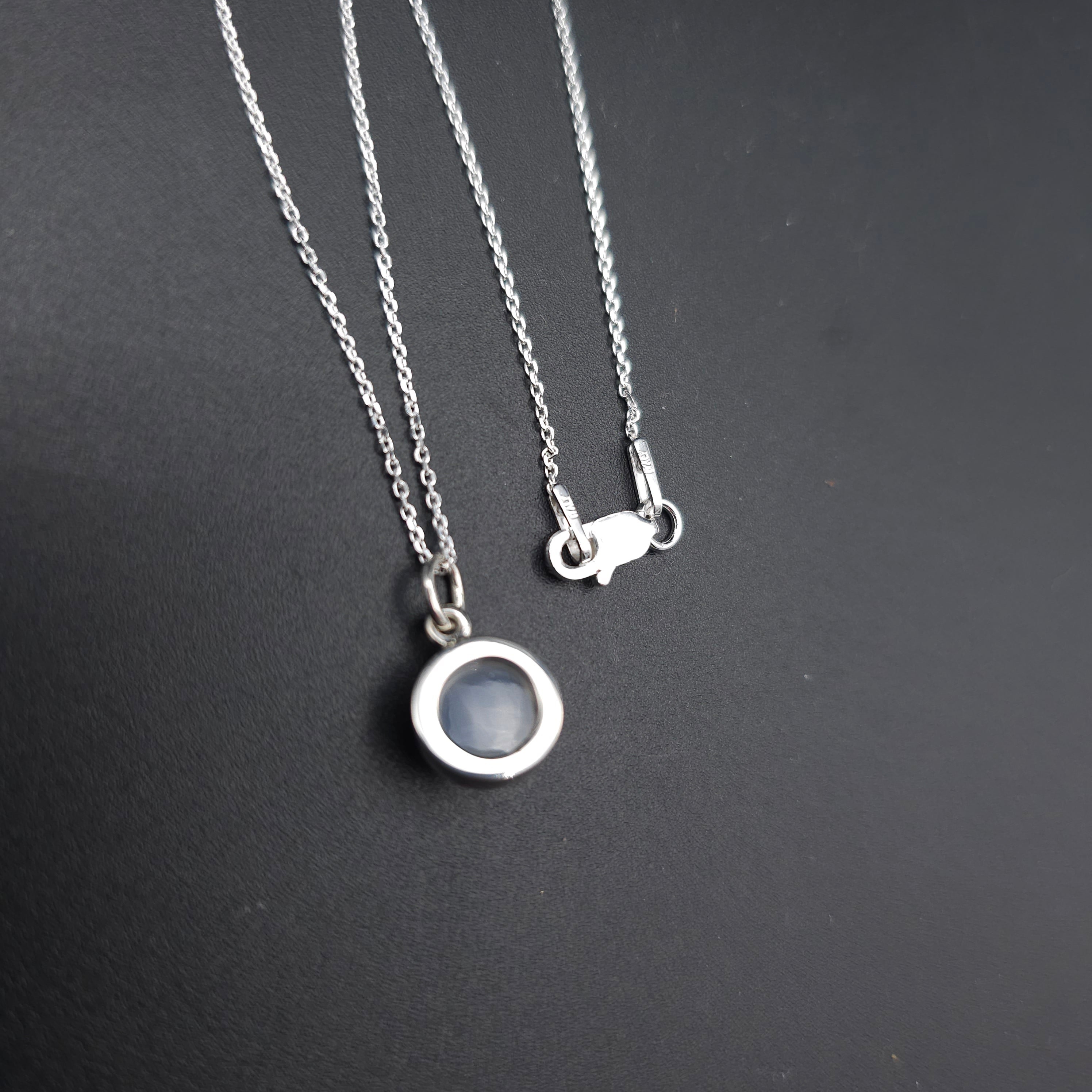 Round moonstone bezel set sterling silver necklace