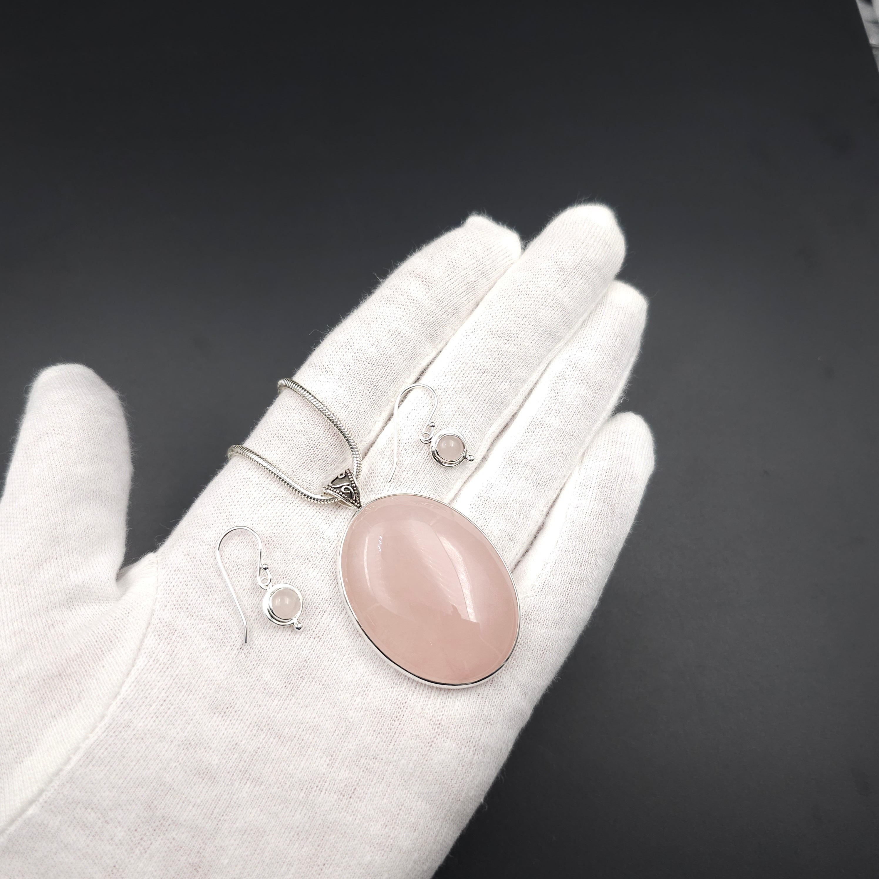 Large oval rose quartz bezel set sterling silver necklace