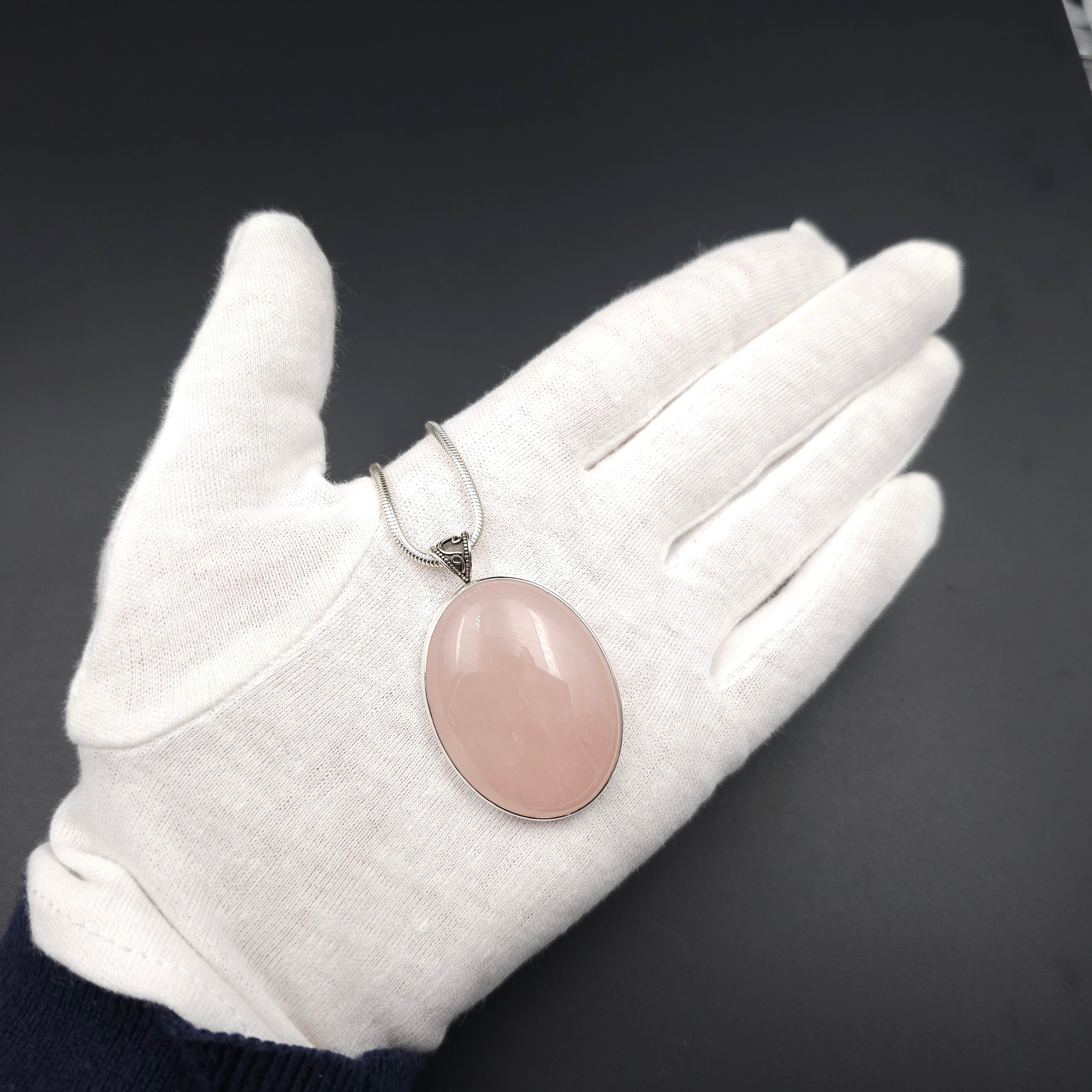 Large oval rose quartz bezel set sterling silver necklace