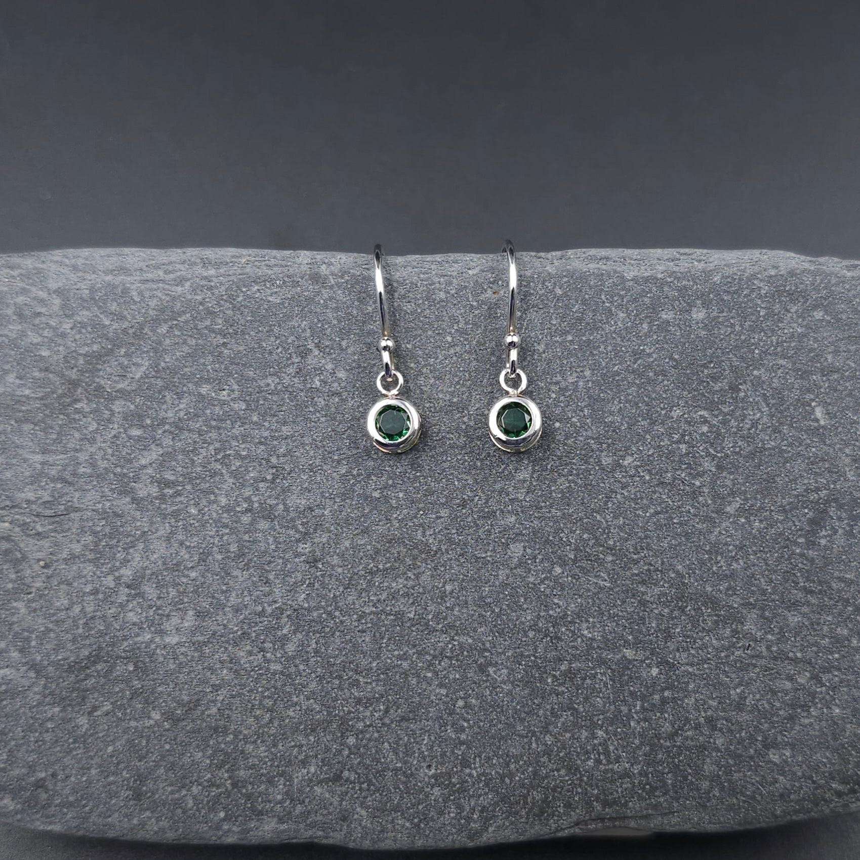 small round faceted green stones bezel set dangle earrings with french earrings wires