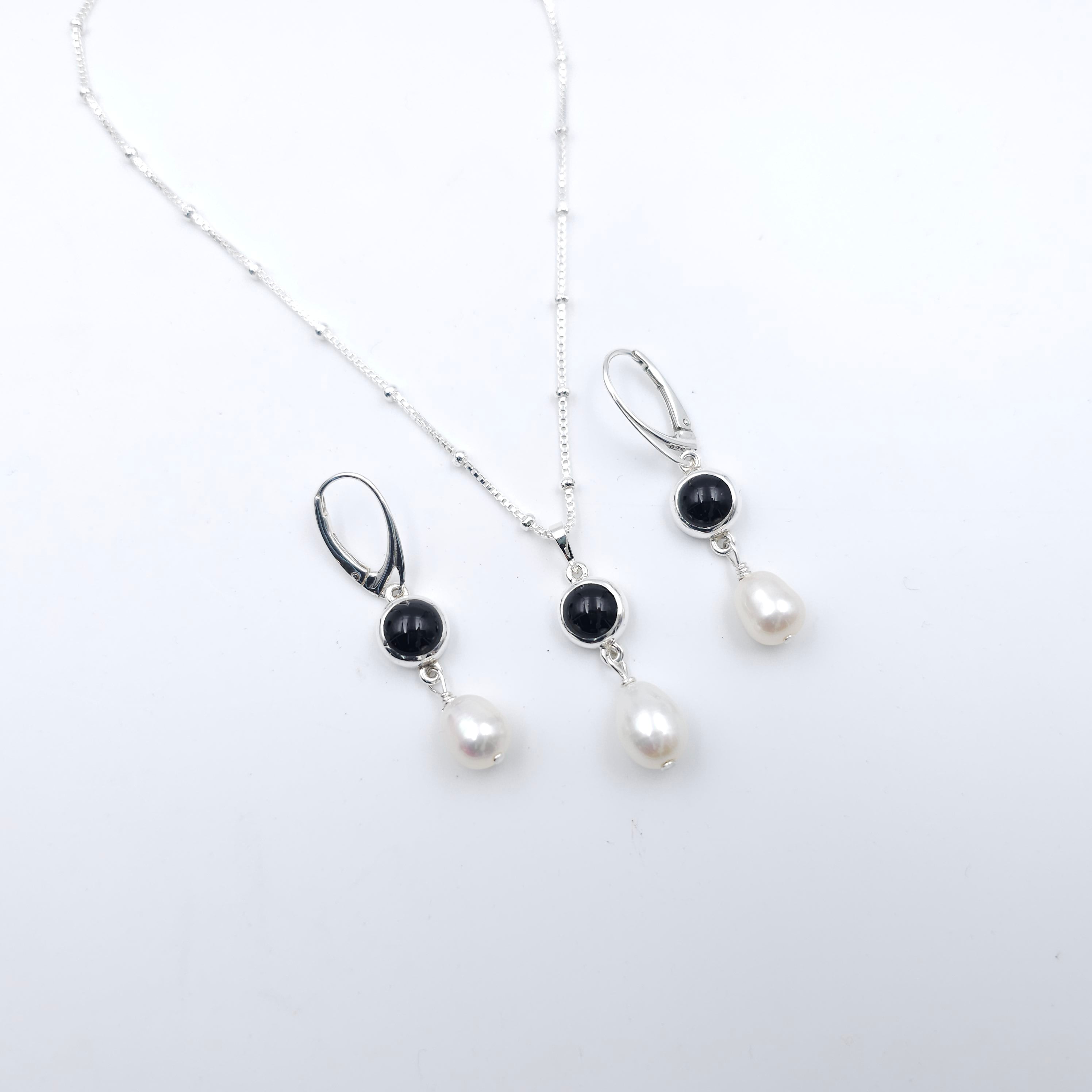 Black onyx and freshwater pearl necklace and earrings set