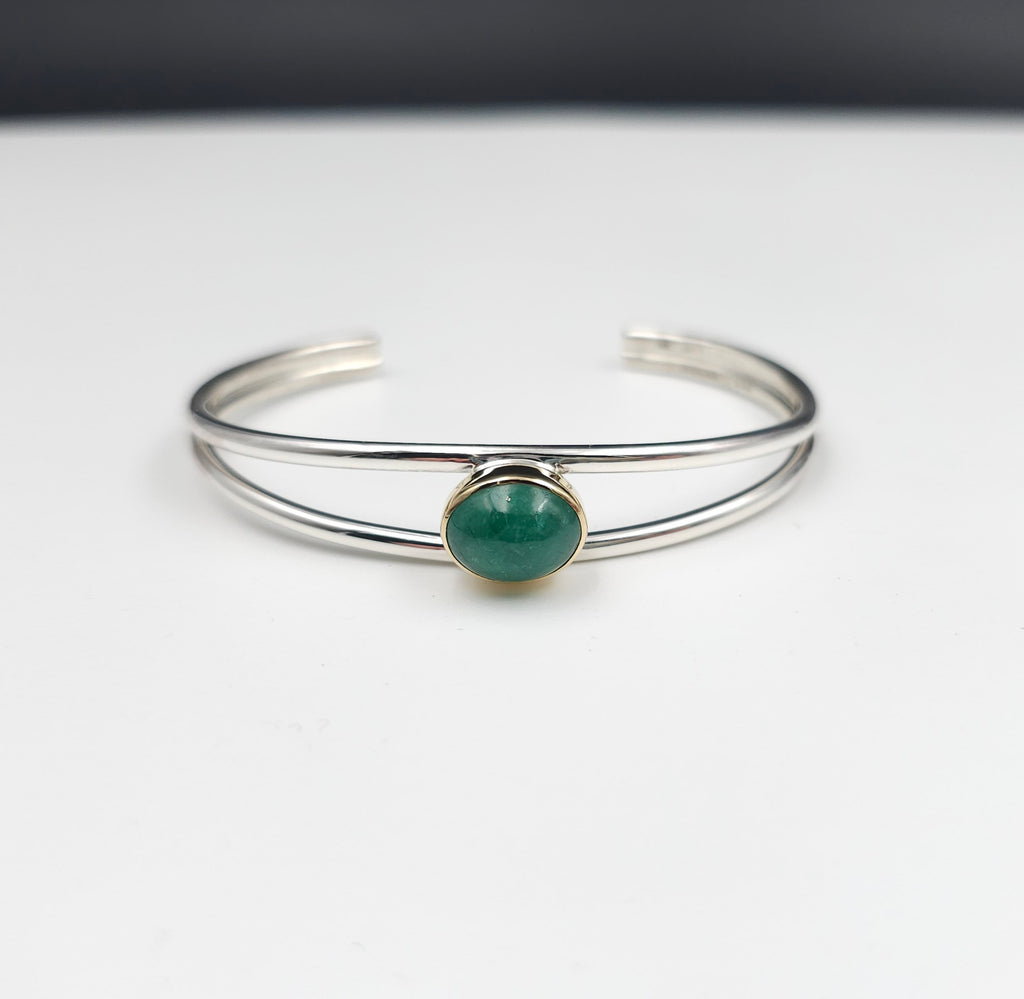 Sterling silver emerald cuff bracelet with 18k gold bezel