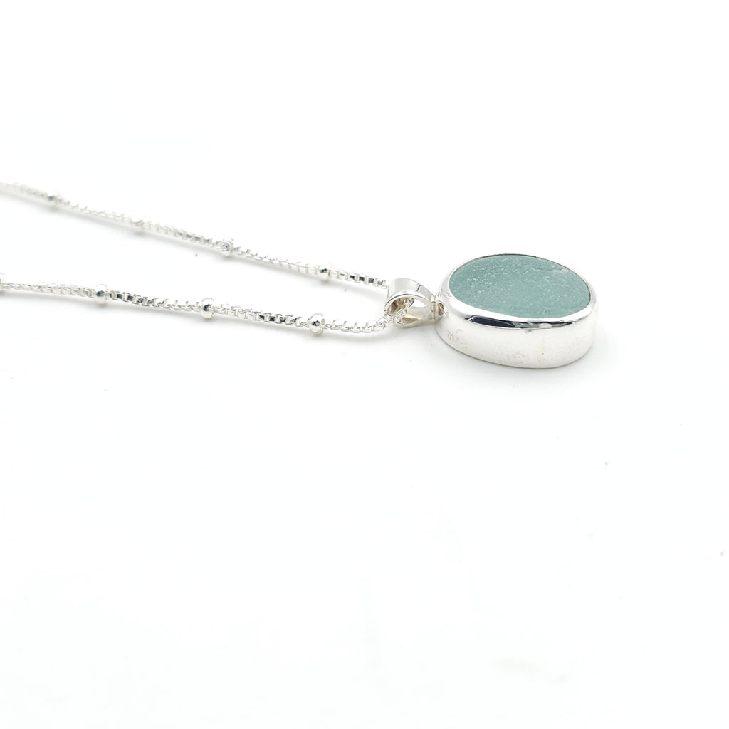 Genuine aqua sea glass sterling silver bezel set necklace