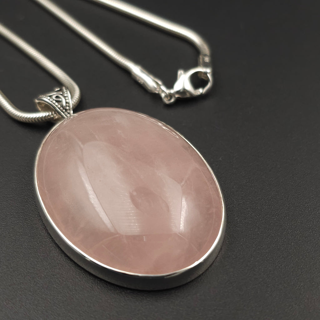 Large oval rose quartz bezel set sterling silver necklace