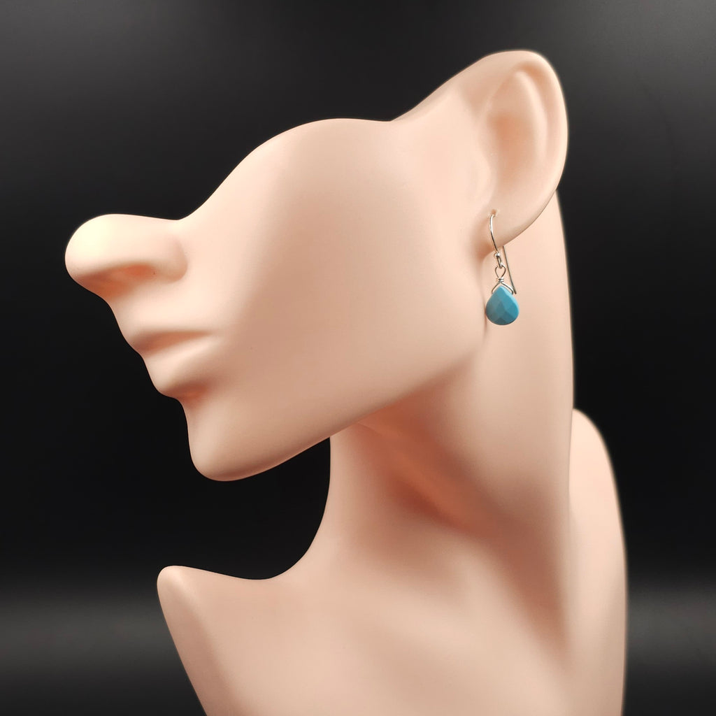 Light blue faceted teardrop bead dangle earrings