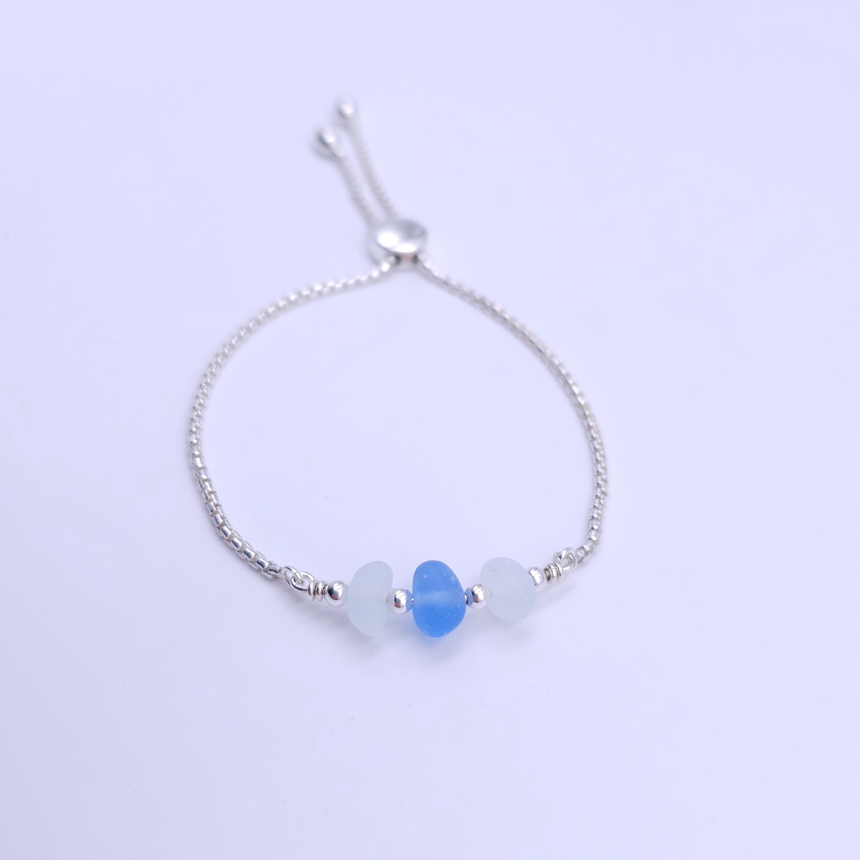 Light blue and white sea glass adjustable slider bracelet