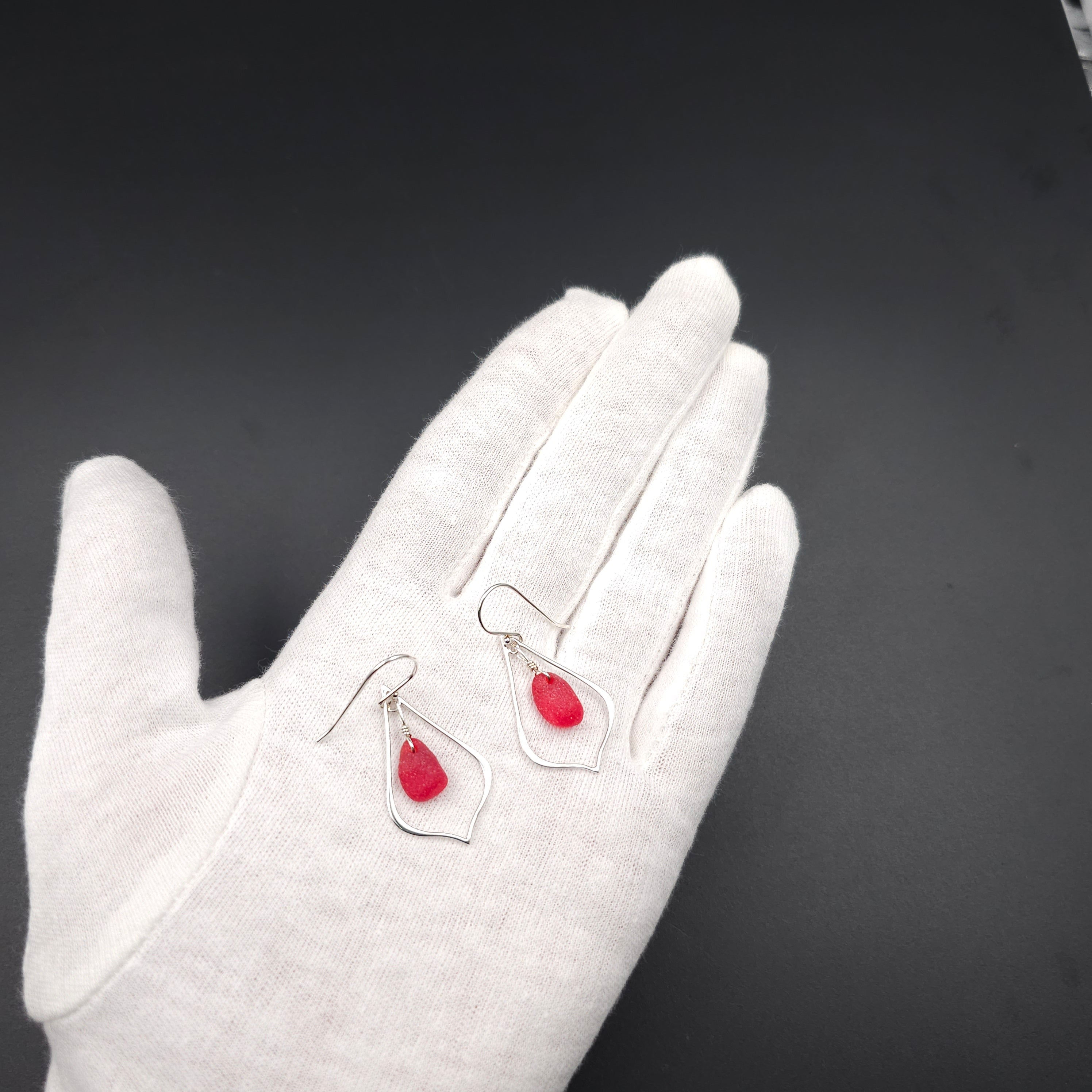 Pointed teardrop sterling silver earrings with red sea glass