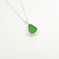 Green bezel set necklace teardrop shaped in sterling silver