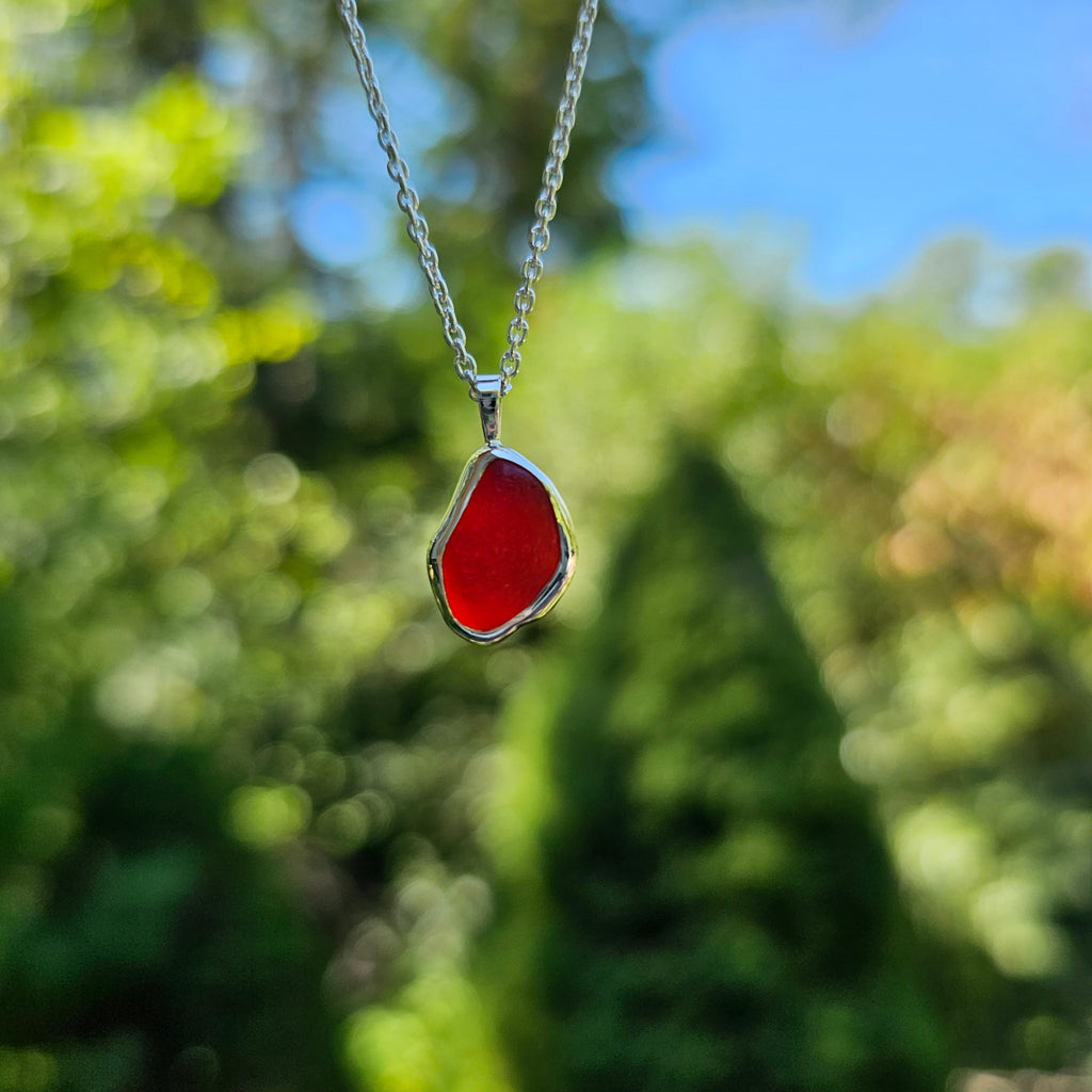 Small genuine red sea glass bezel set necklace