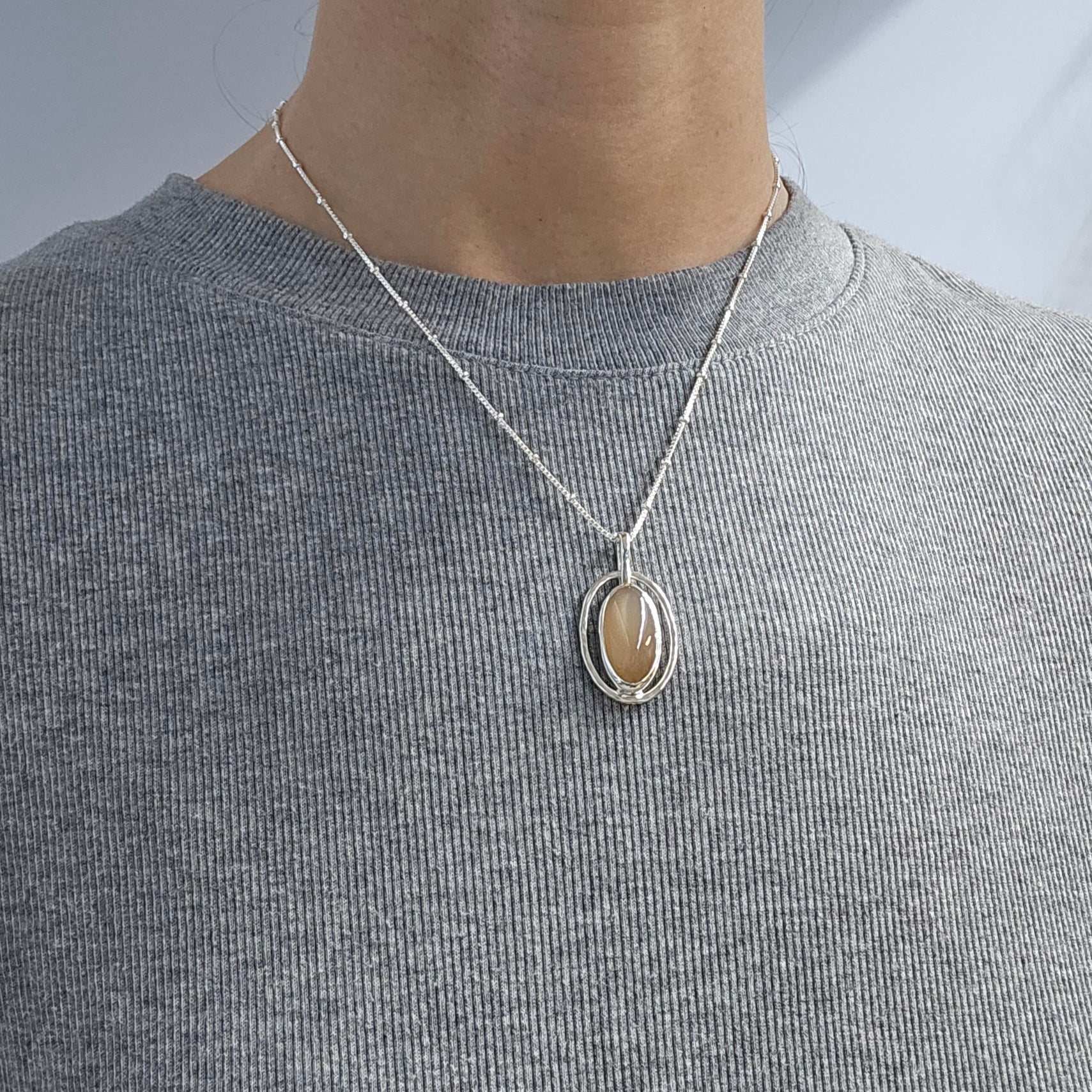 Oval peach moonstone sterling silver necklace