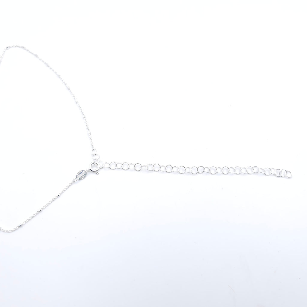 Large wave in circle necklace
