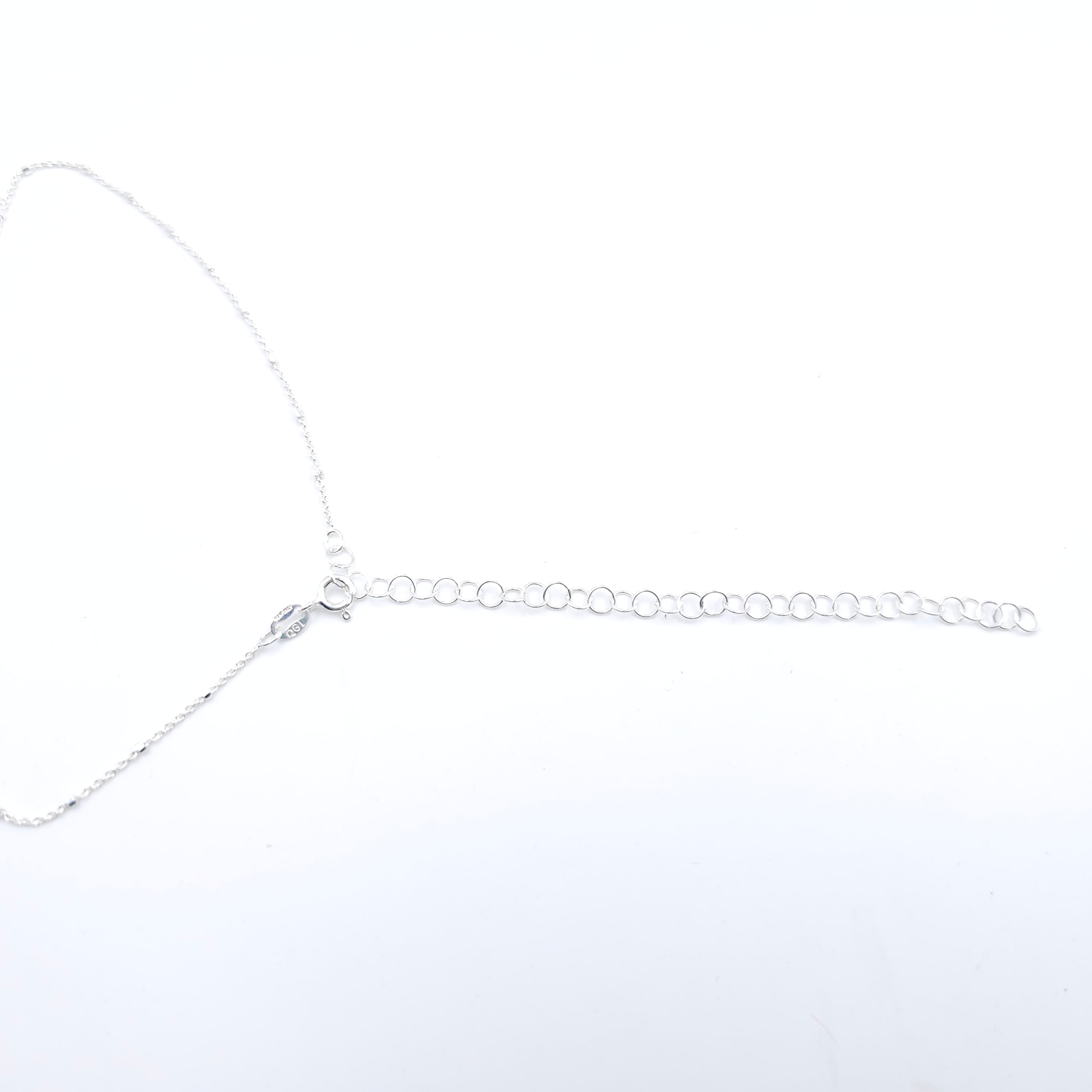 Large wave in circle necklace