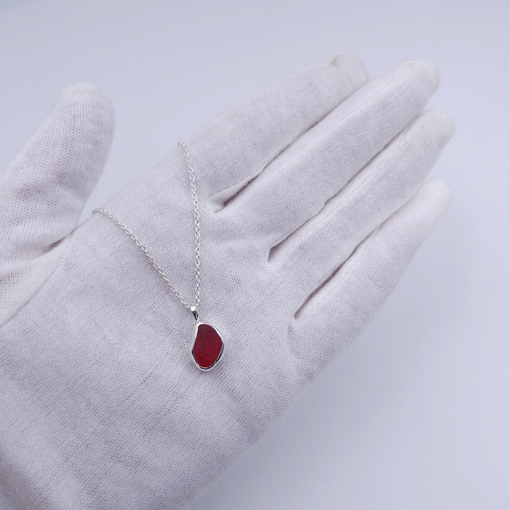 Small genuine red sea glass bezel set necklace