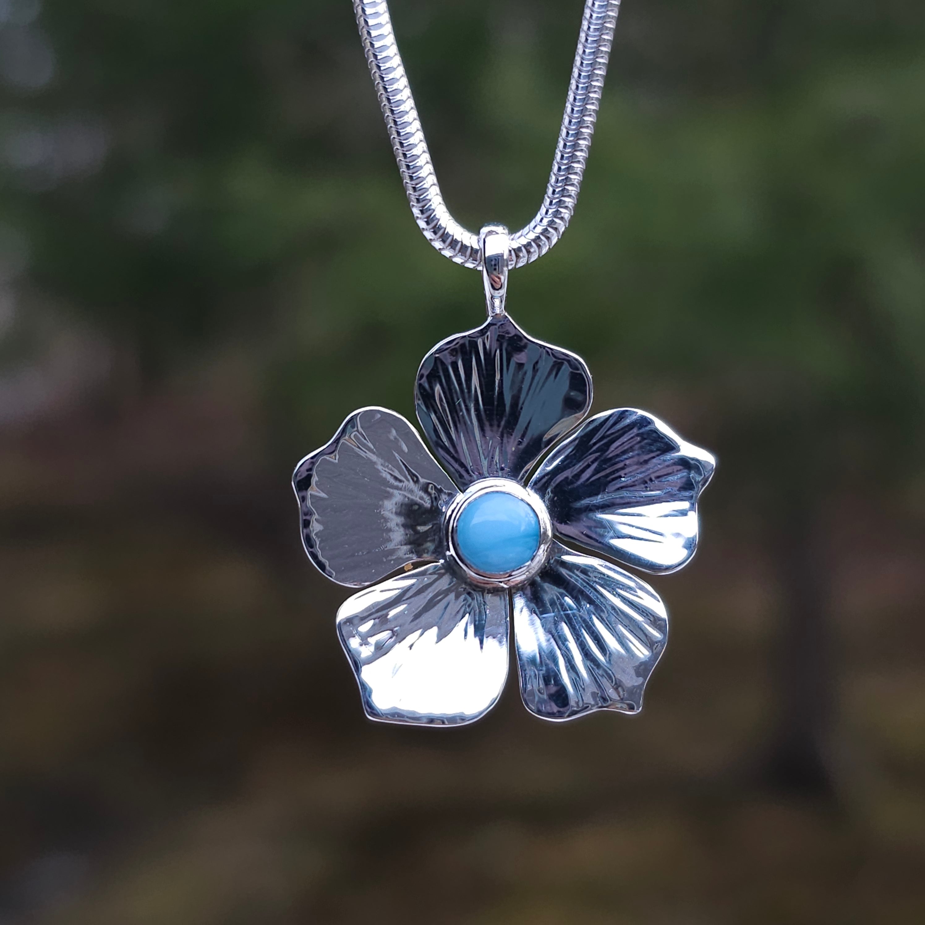 Silver flower necklace with Larimar