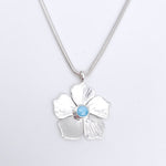 Silver flower necklace with Larimar