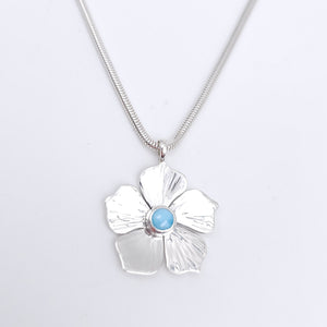 Silver flower necklace with Larimar