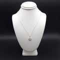 Round moonstone bezel set sterling silver necklace