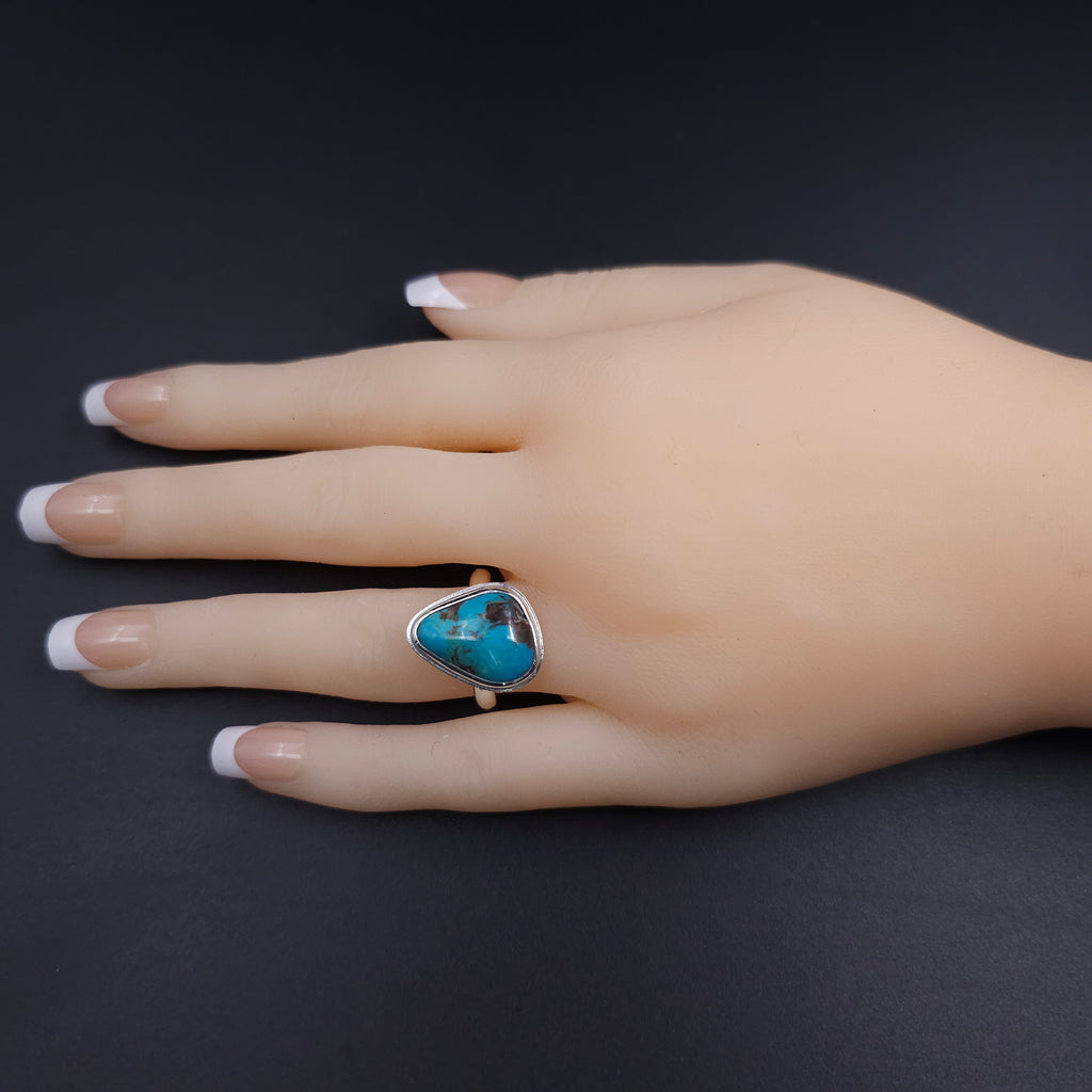 Free-form turquoise bezel set sterling silver ring