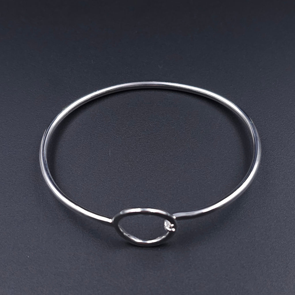 Sterling silver circle hook on bangle bracelet