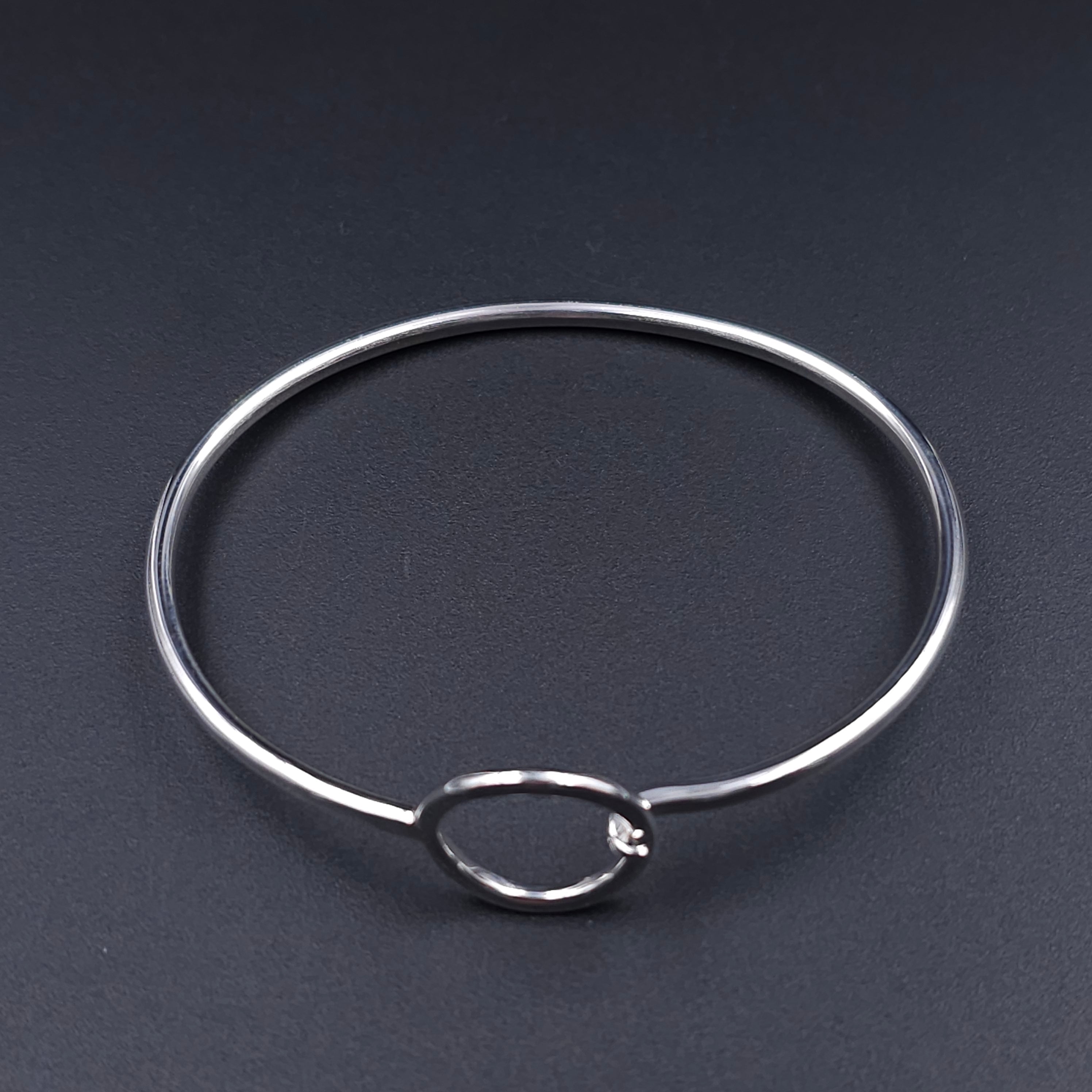 Sterling silver circle hook on bangle bracelet
