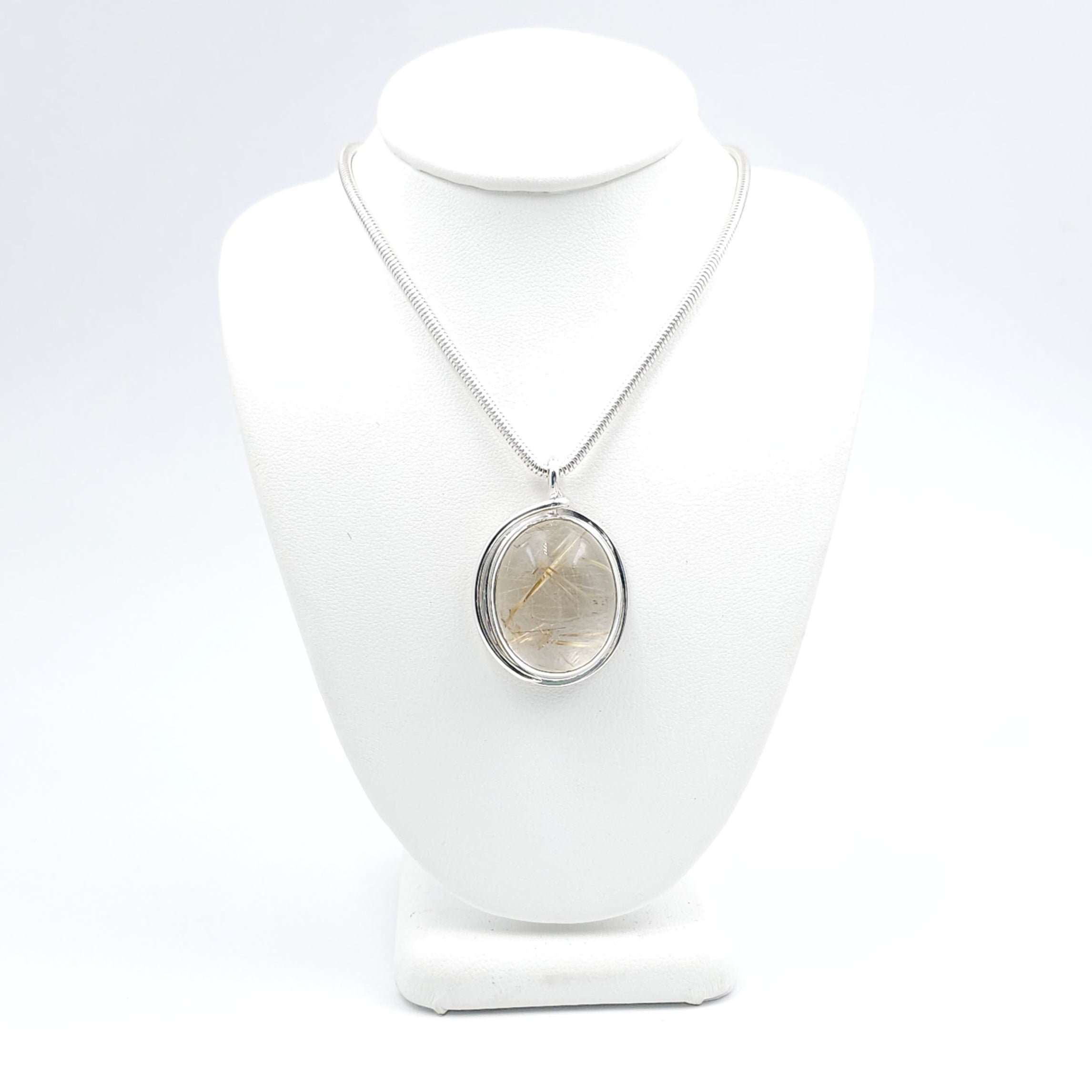 Rutilated quartz bezel set sterling silver necklace