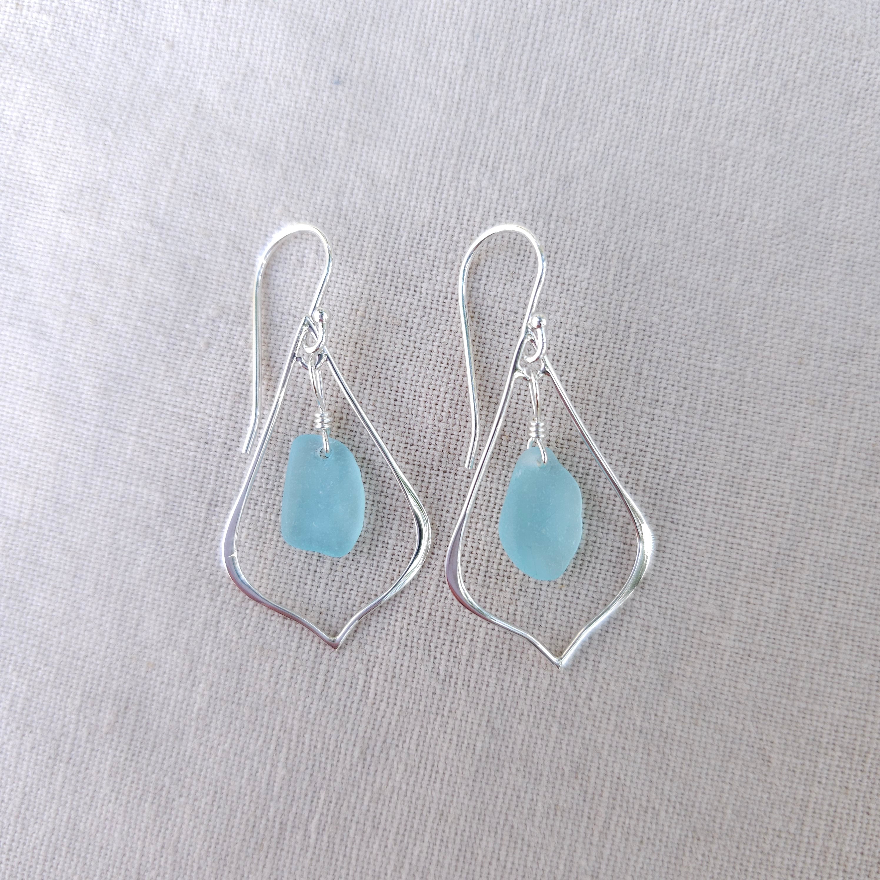 Sterling silver pointed teardrop earrings with light blue sea glass