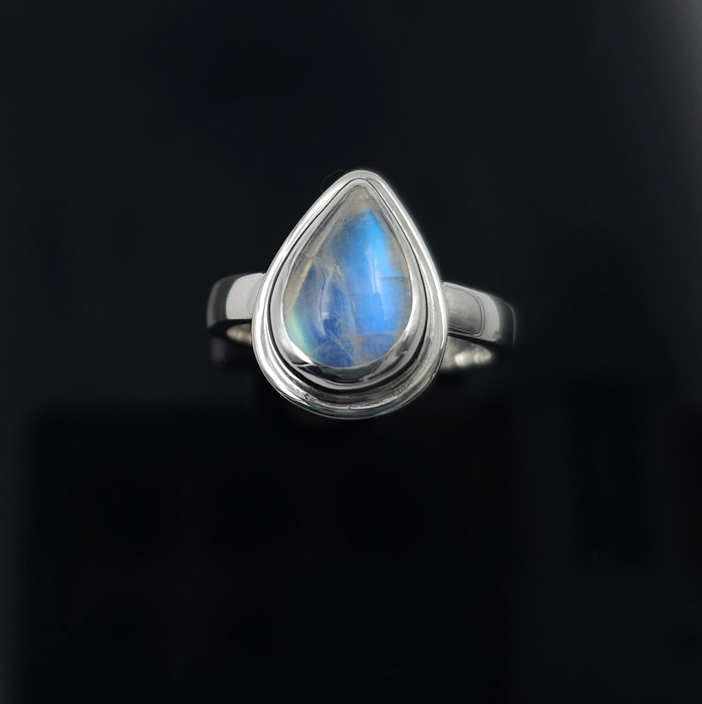 Rainbow moonstone teardrop bezel set sterling silver ring