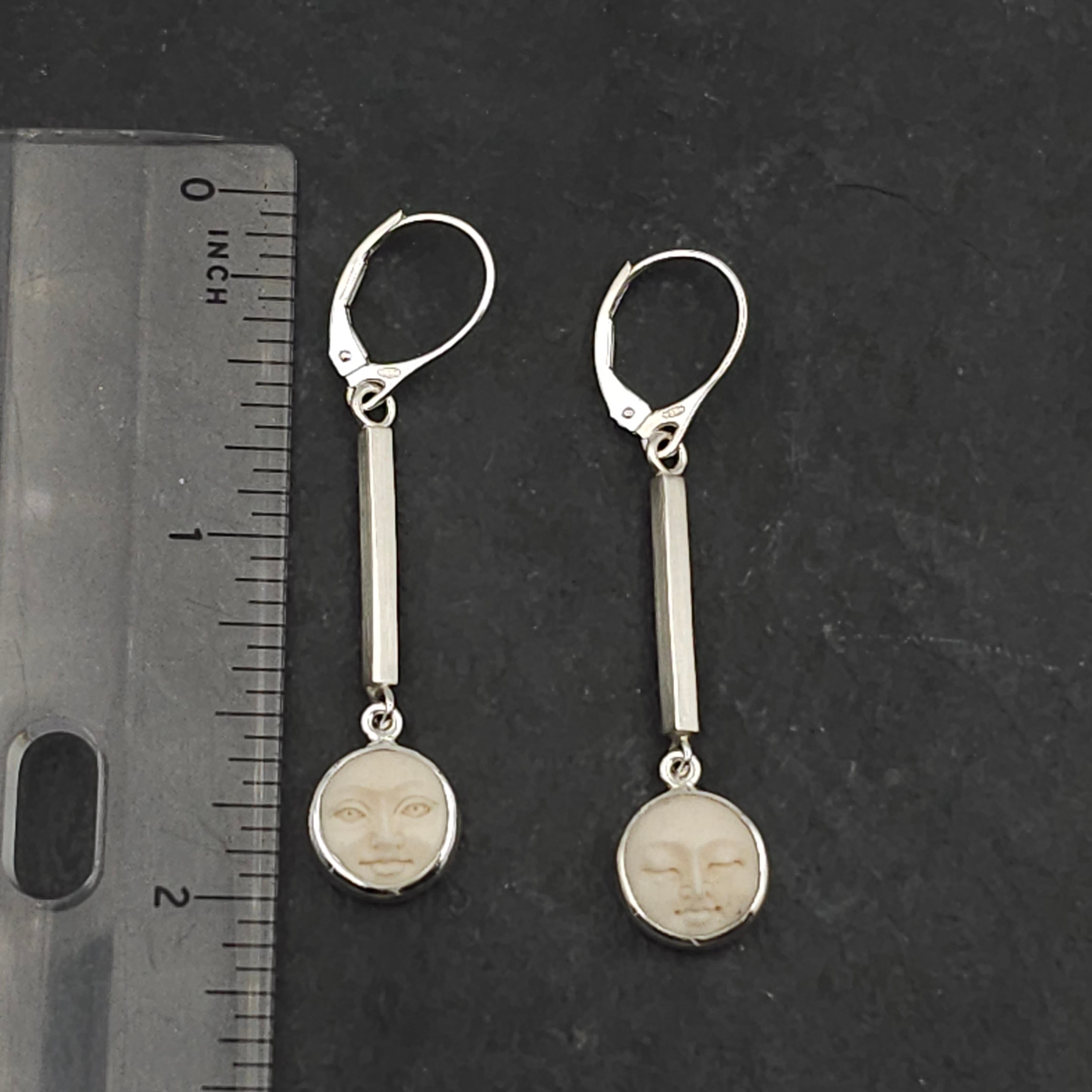 Carved bone face earrings sterling silver
