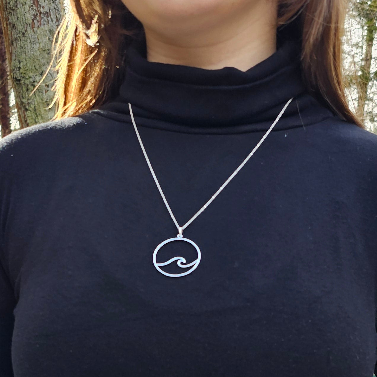 Large wave in circle necklace