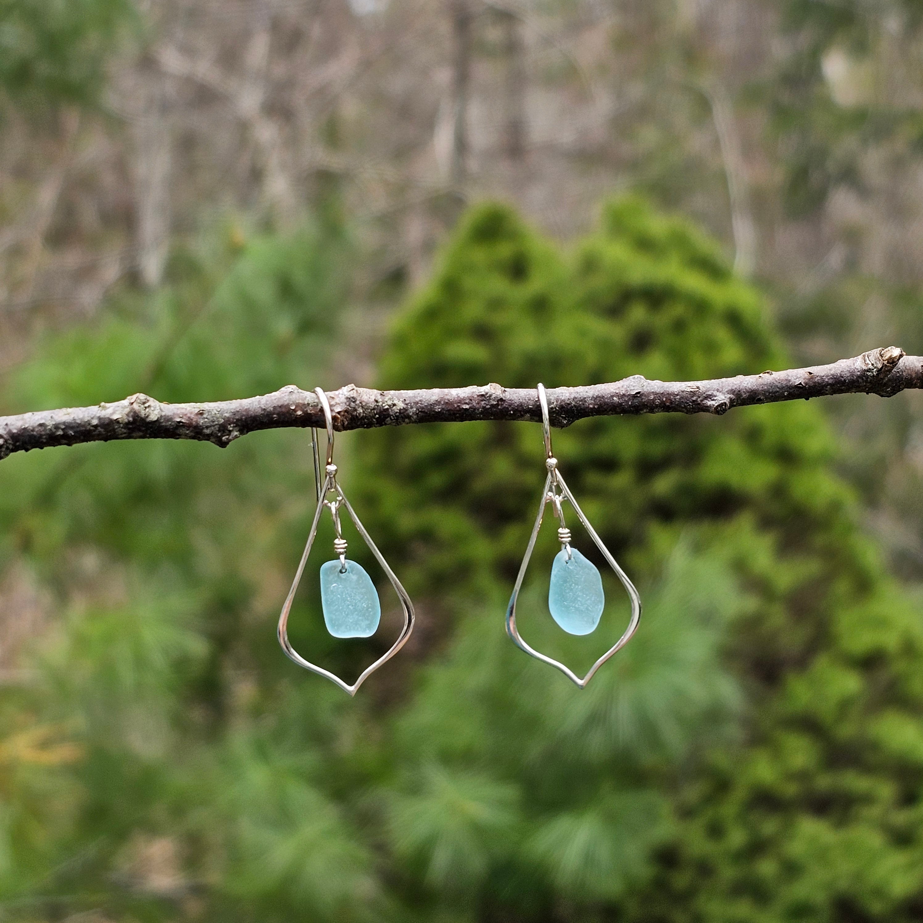Sterling silver pointed teardrop earrings with light blue sea glass