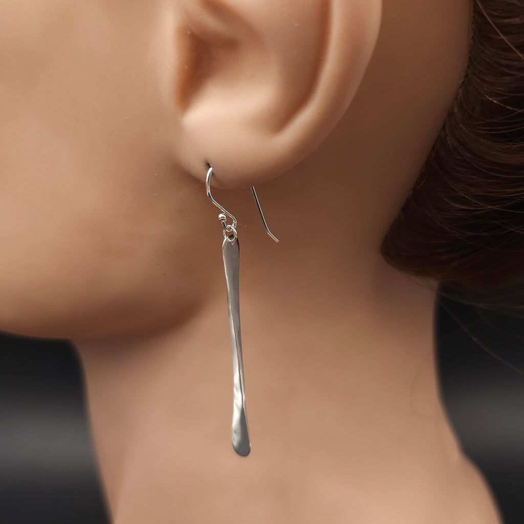 Long hammered sterling silver earrings