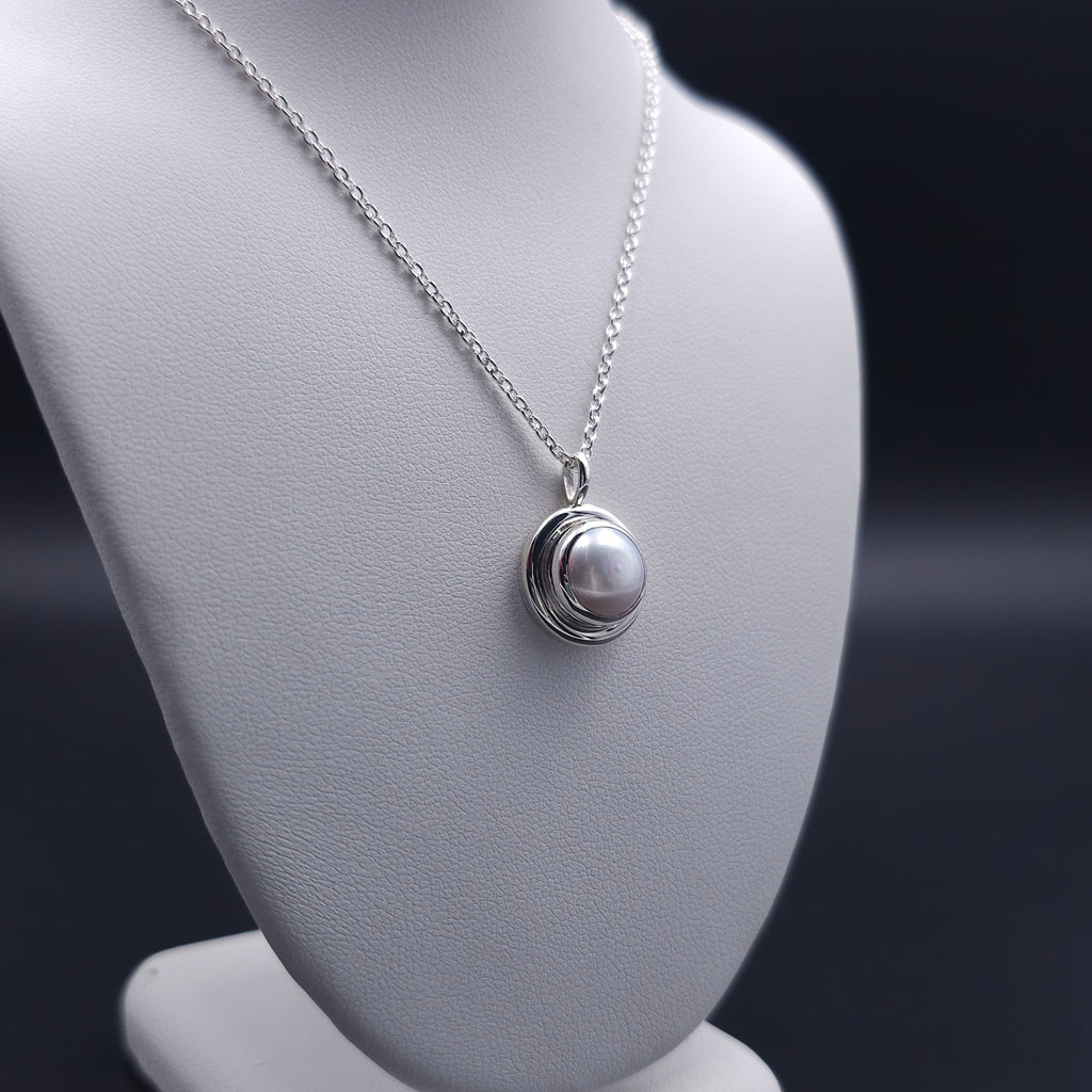Fresh water pearl bezel set sterling silver necklace