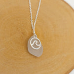 White sea glass necklace with wave in circle