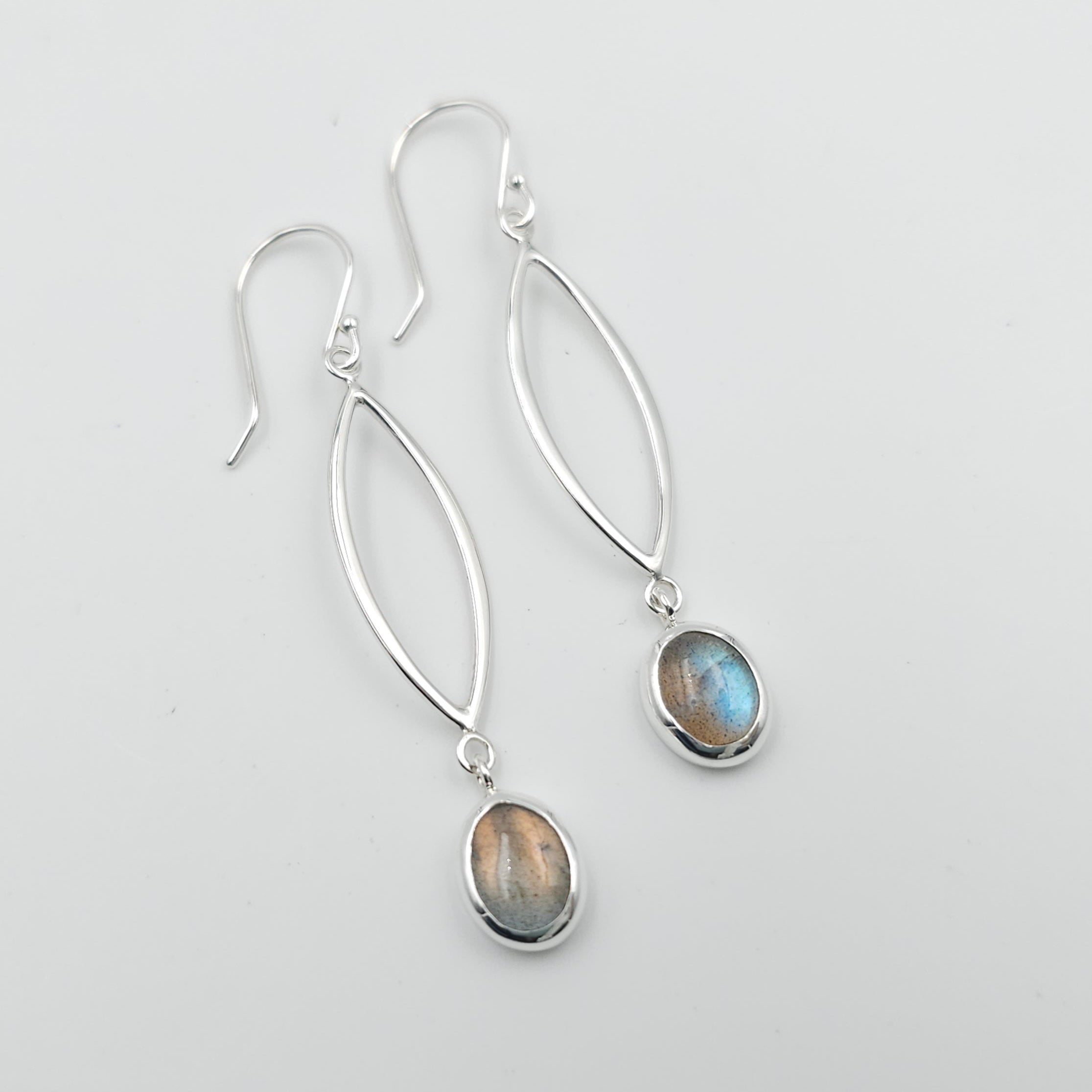 Sterling silver marquis shaped earrings with bezel set oval labradorite dangles
