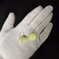 Round brass textured disc earrings with french earrings wires