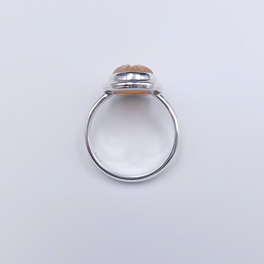Carved peach moonstone sterling silver ring