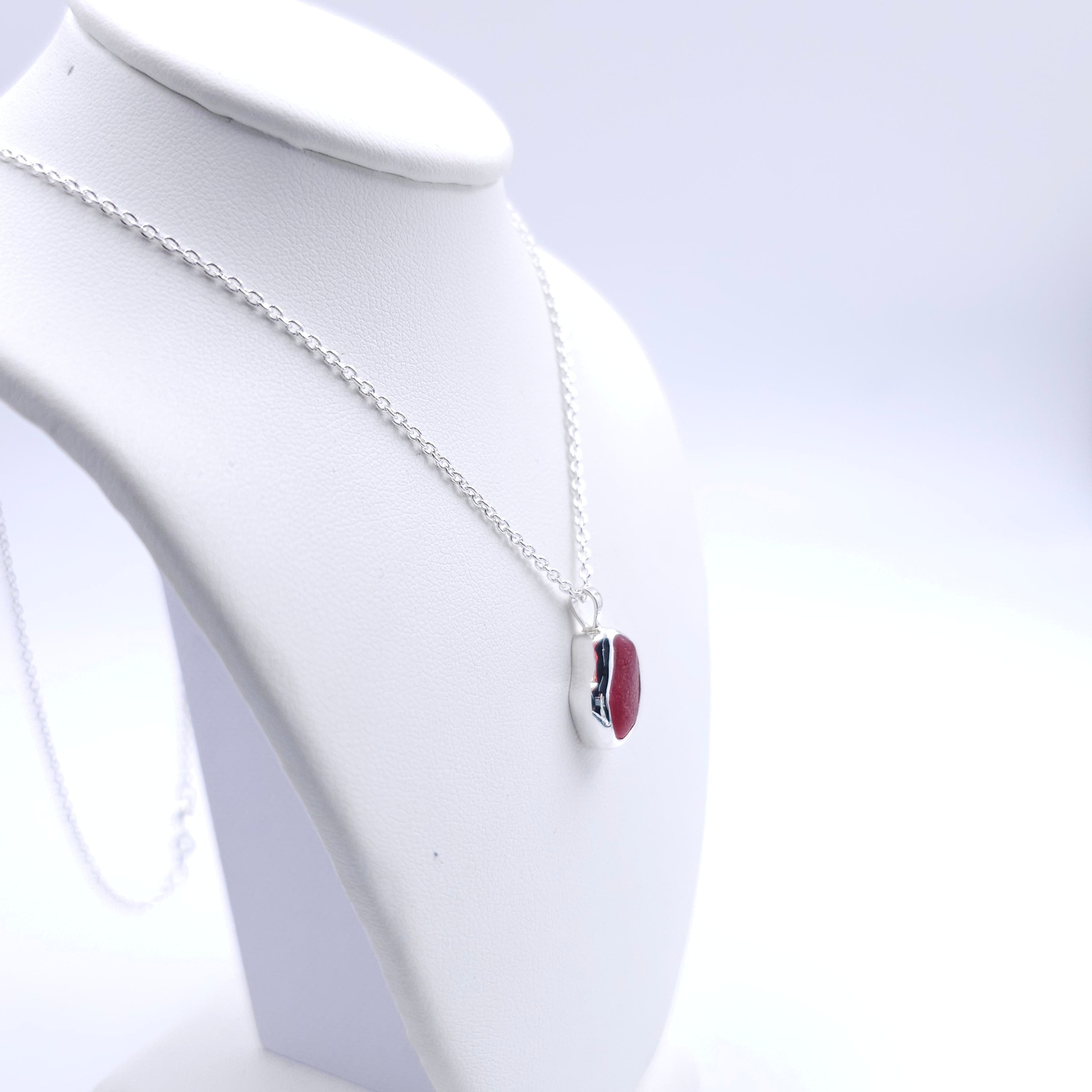 Small genuine red sea glass bezel set necklace