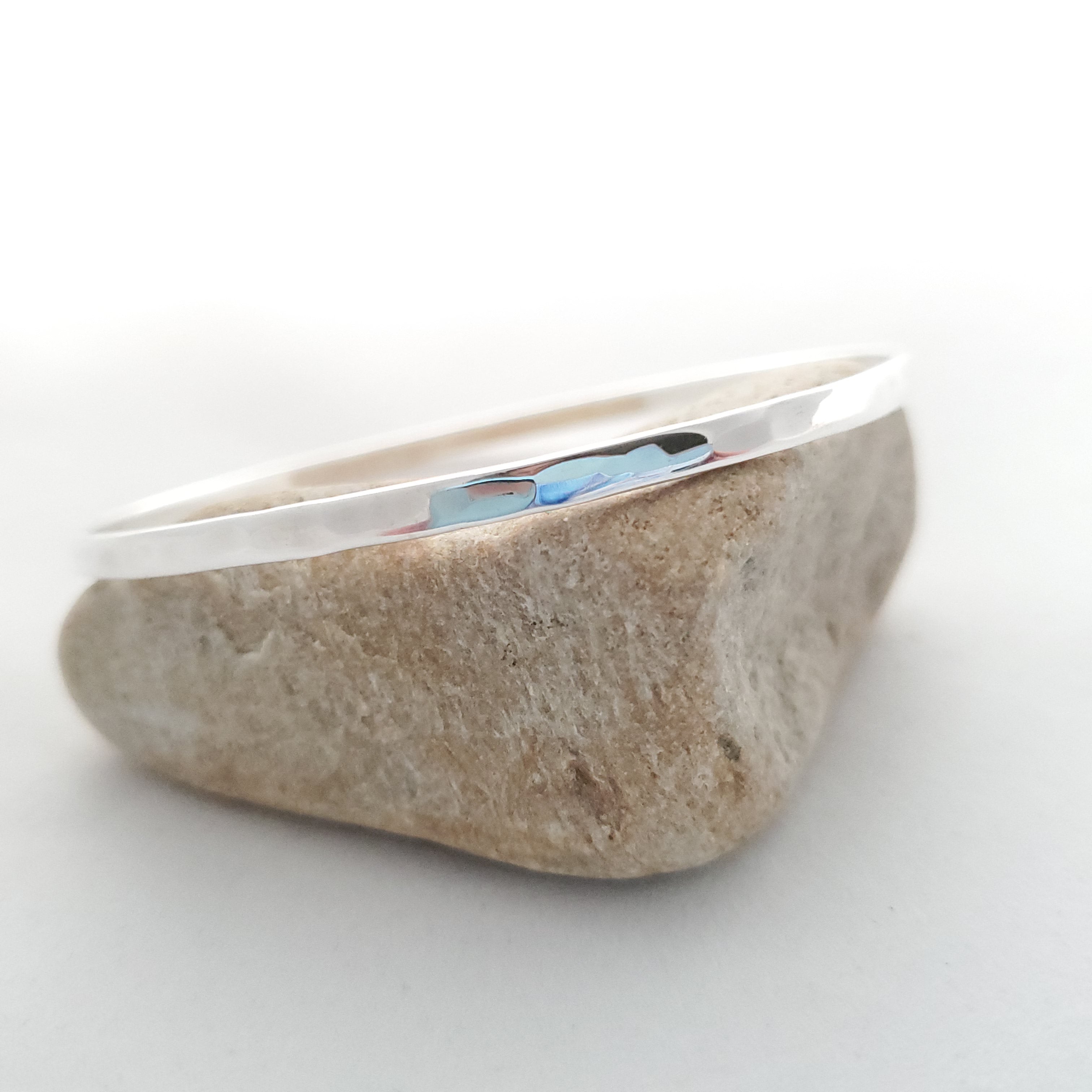Close up of hammered texture on back of bracelet