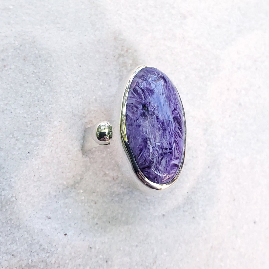 Purple and white swirly charoite oval gemstone ring