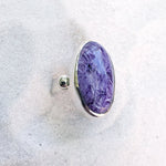 Purple and white swirly charoite oval gemstone ring