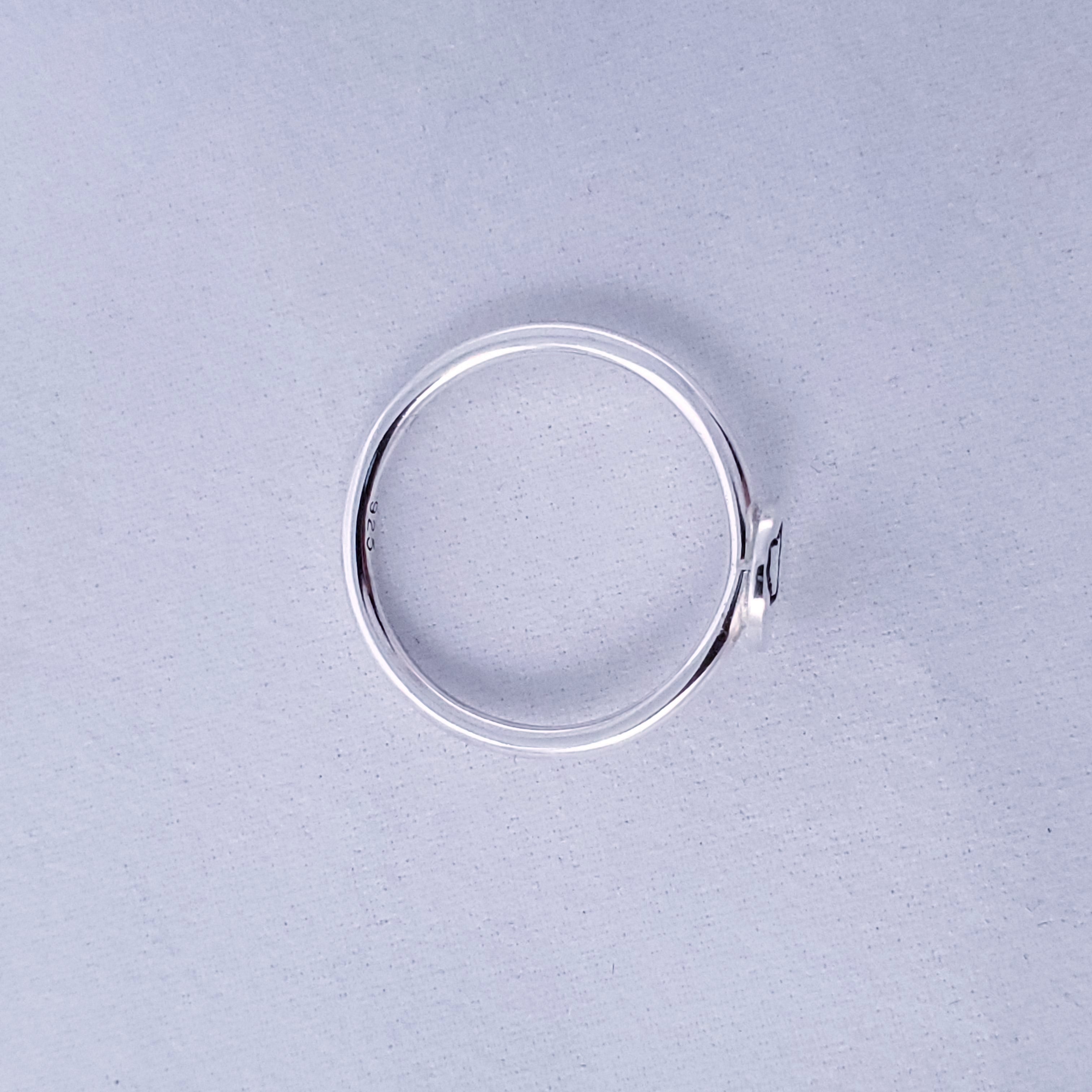 Top view of silver Maine ring