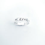 Name ring with name Evan and a heart stamped