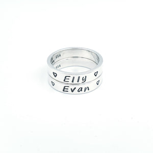 Hand stamped silver name ring with hearts