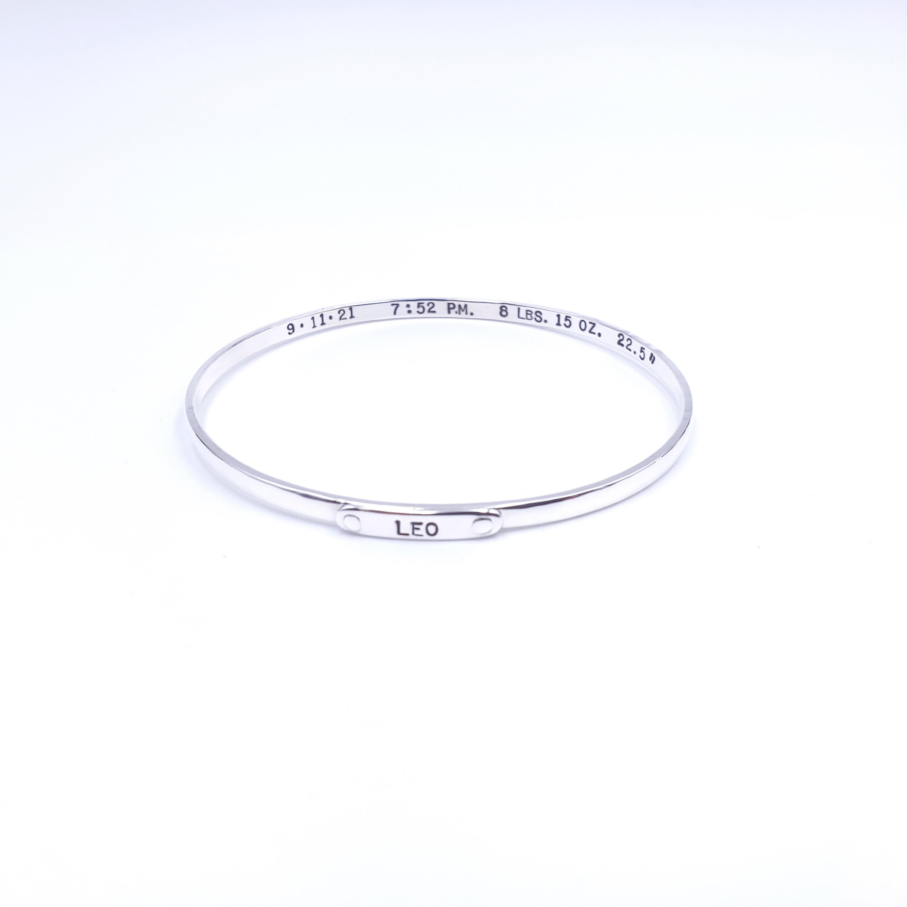 Silver bracelet with name Leo stamped 