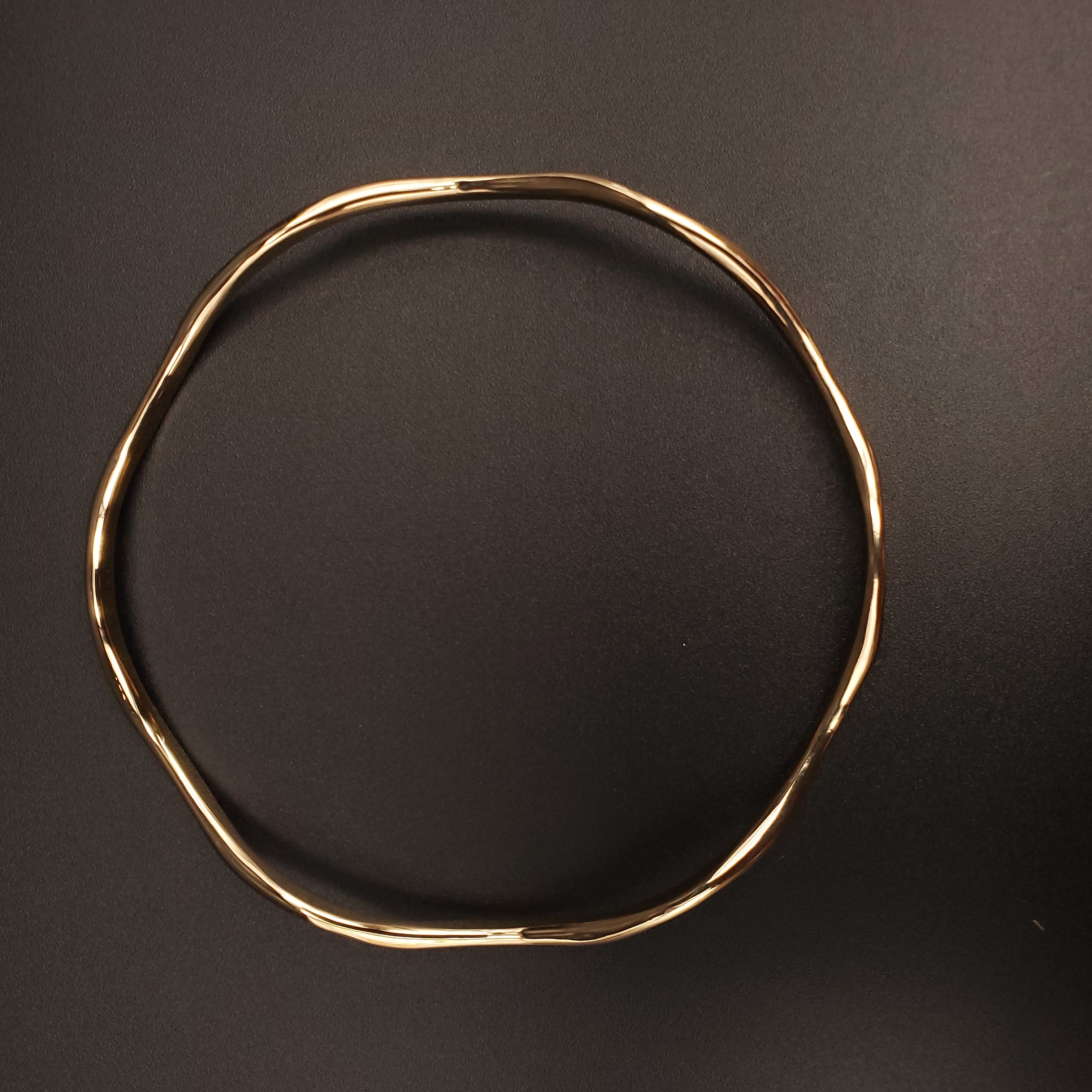 gold wavy bangle bracelet