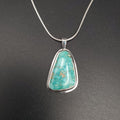 Freeform shaped turquoise silver necklace on snake chain