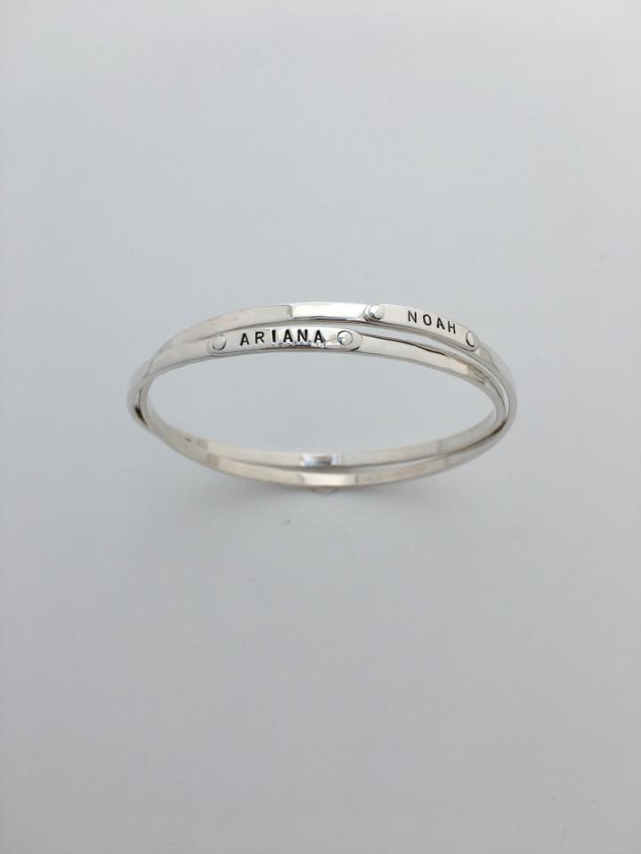 Double silver bangle bracelets with names Ariana and Noah