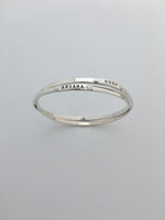 Double silver bangle bracelets with names Ariana and Noah